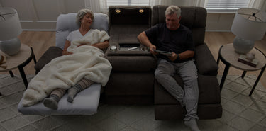 two-people-sitting-on-zofa-sofa